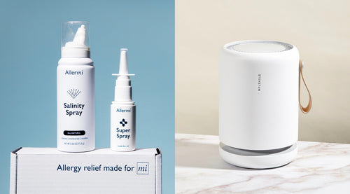 Allermi Salinity Spray and Super Spray bottles on a branded box, beside a white Molekule air purifier